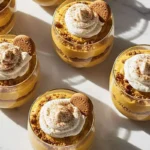 A 10-Minute Pumpkin Mousse Parfaits dessert in clear glass dessert cups