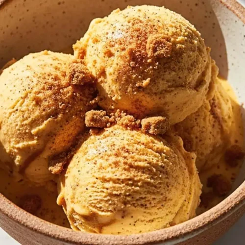 Creamy, dreamy Pumpkin Spice Ice Cream made without an ice cream maker using just heavy cream, sweetened condensed milk, and warm autumn spices.
