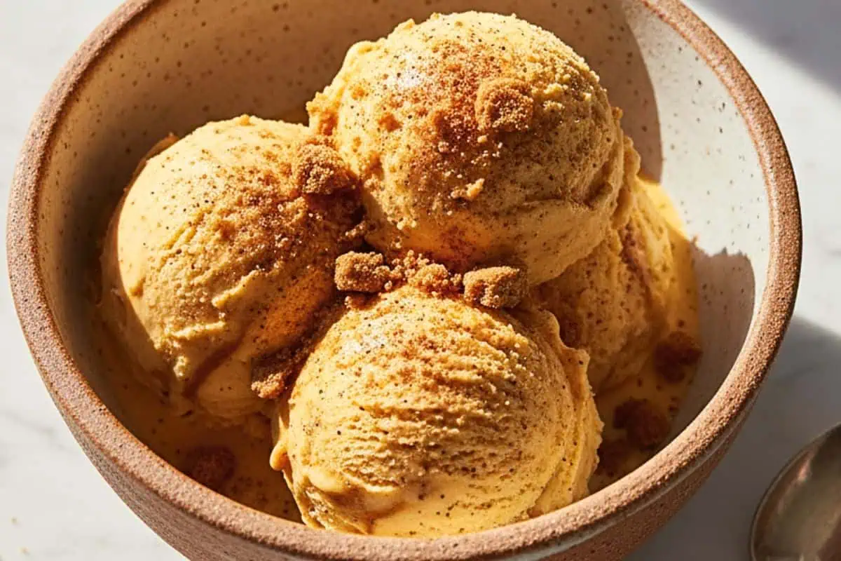Creamy, dreamy Pumpkin Spice Ice Cream made without an ice cream maker using just heavy cream, sweetened condensed milk, and warm autumn spices.