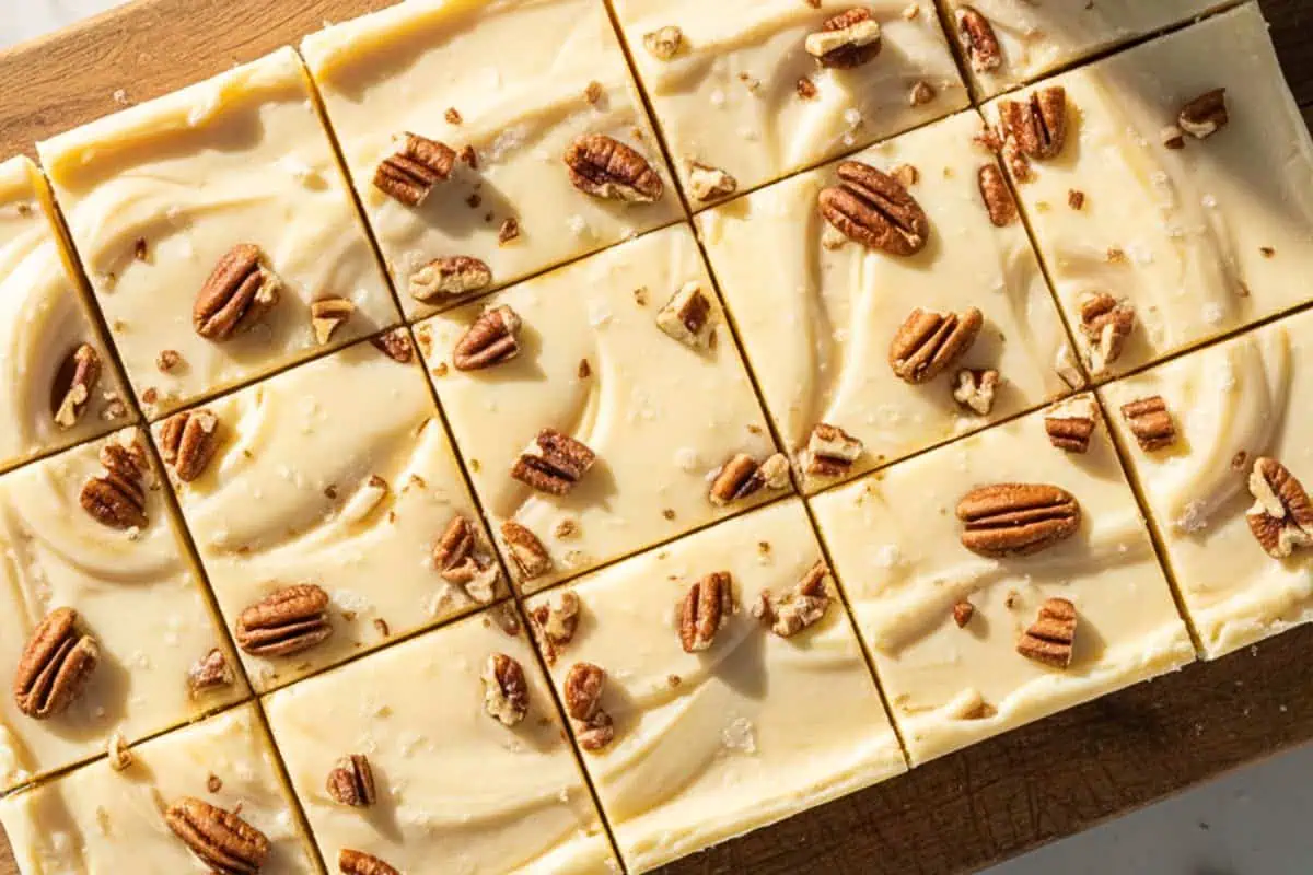 A maple fudge in a rustic wooden serving board