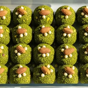 Matcha Pistachio Protein Balls in a Airtight storage container