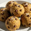 Tahini Chocolate Chip Protein Balls in a white ceramic plate