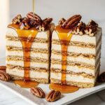 13 No-Bake Thanksgiving Desserts - maple pecan icebox cake slices on a white square plate on a clean white marbled table.